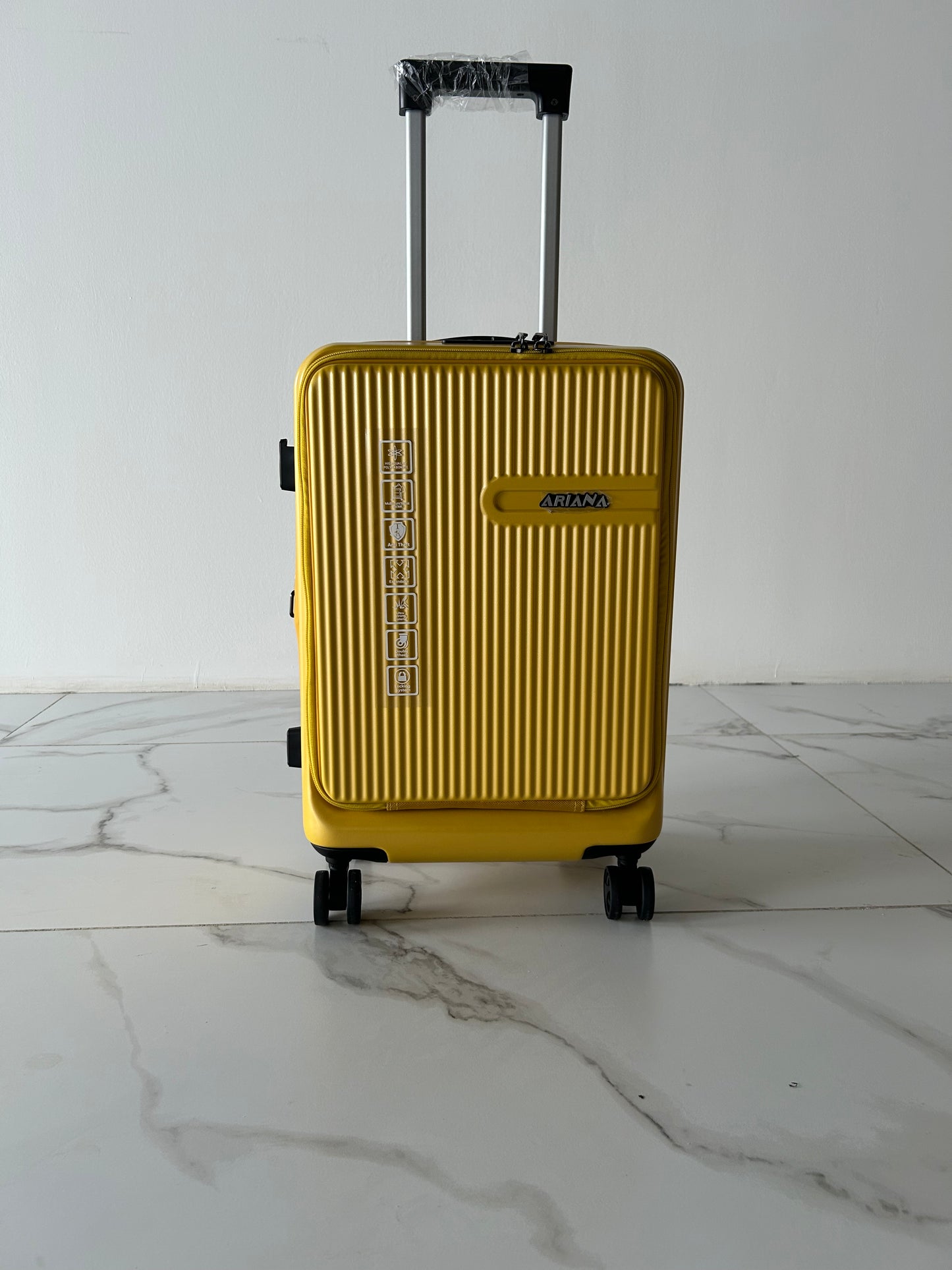 حقيبة سفر صلبة بعجلات دوارة 360 درجة من ARIANA باللون الأصفر